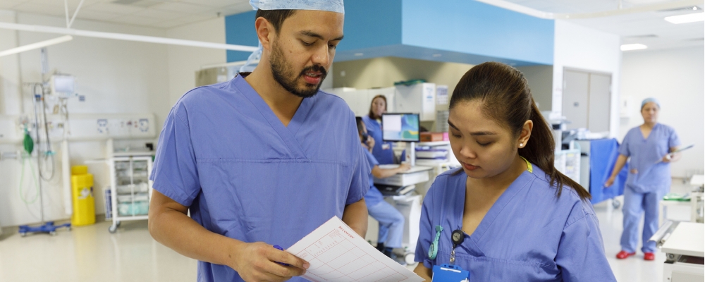 Doctors reviewing documentation