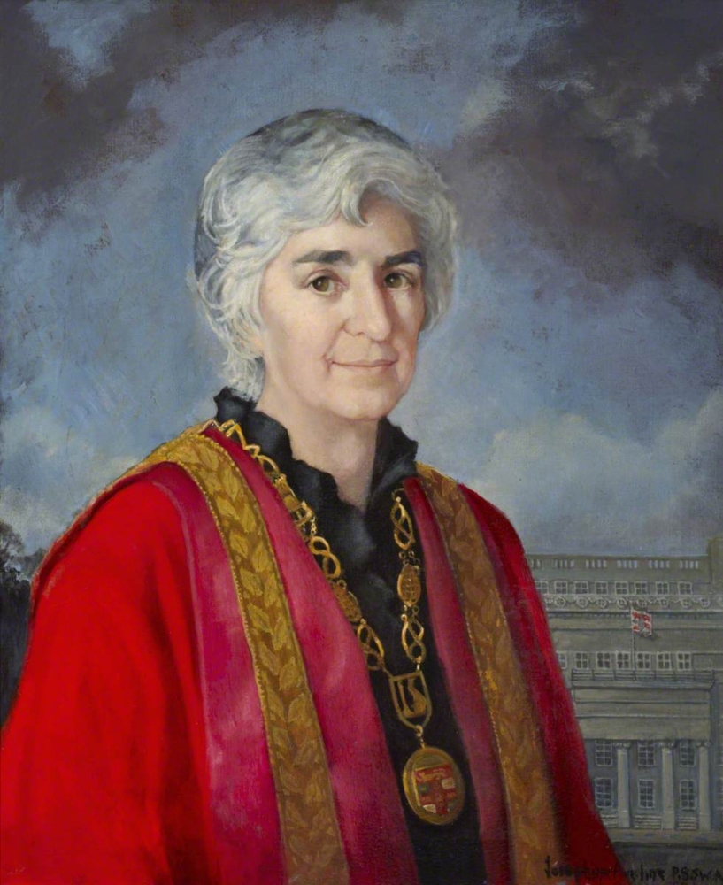 Formal portraiture of Dr Aileen Adams in her regalia as Dean. 