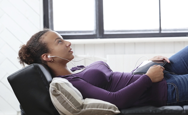 Patient listening to the relaxation recordings