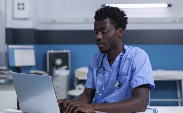 Doctor on computer