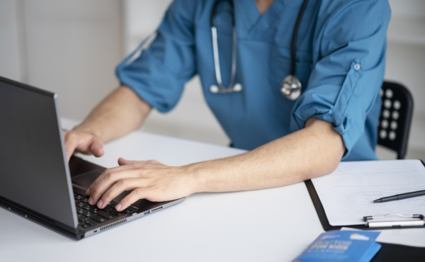 Doctor working at a computer
