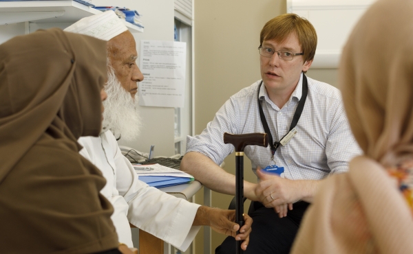 Doctor discussing care with patients